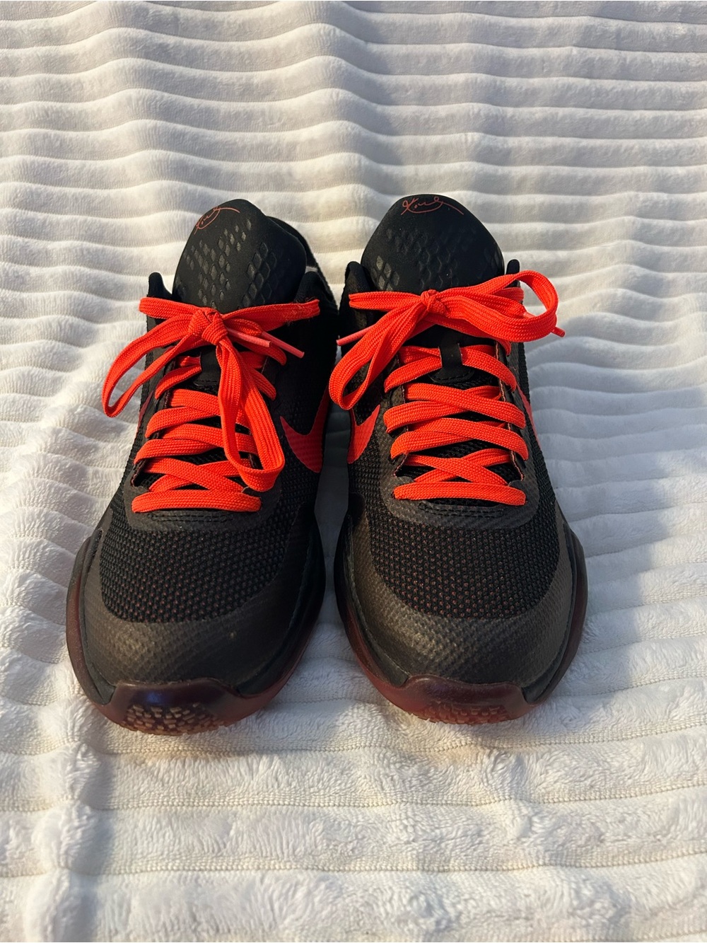 Nike Black Athletic Shoes with Red Accents